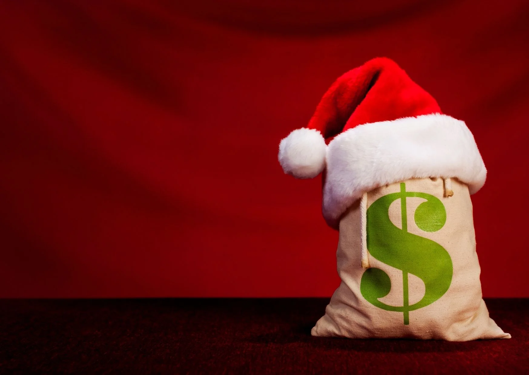 Bagful of Money With Christmas Hat Decoration